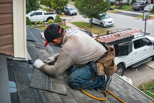 Professional Roofing technician working in Mc Lean, NY